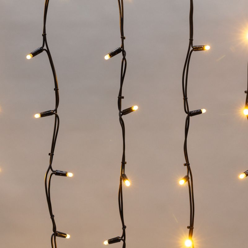 Гирлянда светодиодная Бахрома (Айсикл) 5,6x0,9м 240 LED ТЕПЛЫЙ БЕЛЫЙ черный каучук 3,3мм IP67 эффект мерцания 230В нужен блок 315-000 NEON-NIGHT - Фото 3