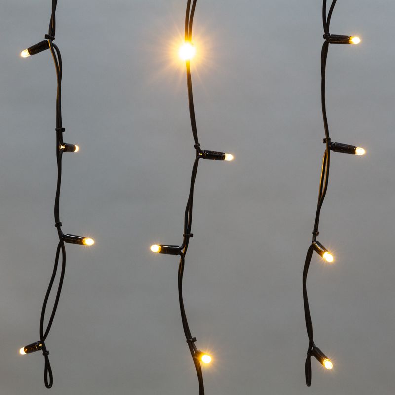 Гирлянда светодиодная Бахрома (Айсикл), 3,2х0,6м, 88 LED ТЕПЛЫЙ БЕЛЫЙ, черный КАУЧУК 3,3мм, IP67, по - Фото 3